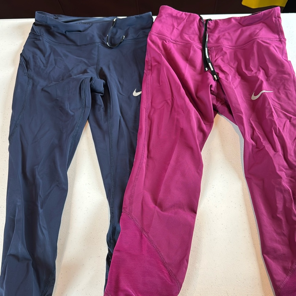 Nike women’s running leggings in navy and purple. Size XS